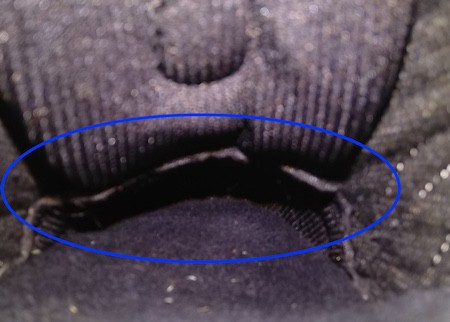There's a little piece of material that can press against the base of your little toe