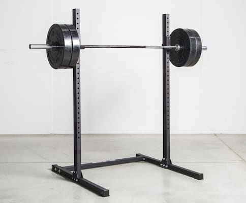 Rogue's budget echo squat stand with loaded barbell 