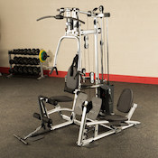 Powerline home gym with leg press station in white and black
