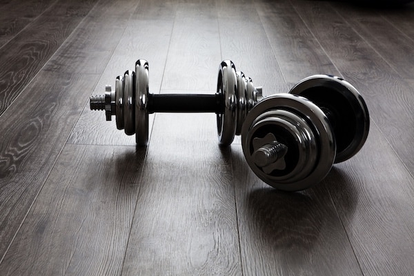 Dumbbells are some of the best exercise equipment for apartments and small spaces
