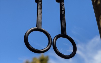 Rogue Gymnastic rings hanging from pull-up bar