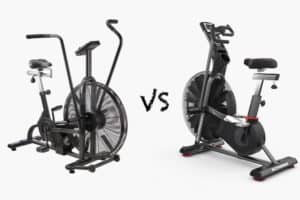 Assault bike vs airdyne against a gray background