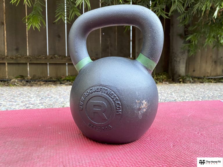 Rogue kettlebell on a yoga mat in a patio